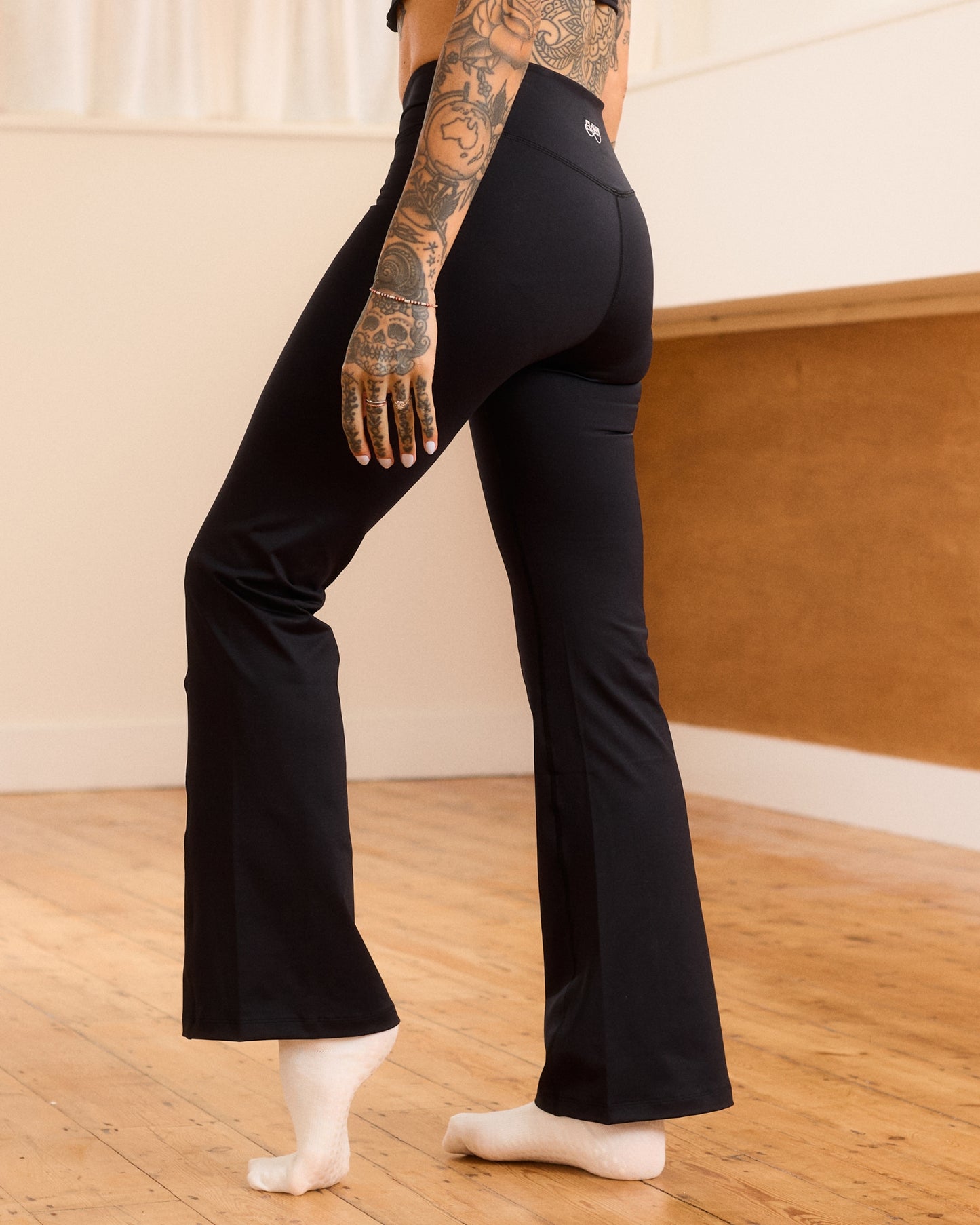 Crossover Waist Flared Legging - Black